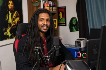 Eric Mr. E Williams in a Reggae Hour podcast studio setting